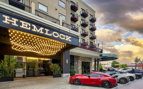 a red sports car parked outside of a building