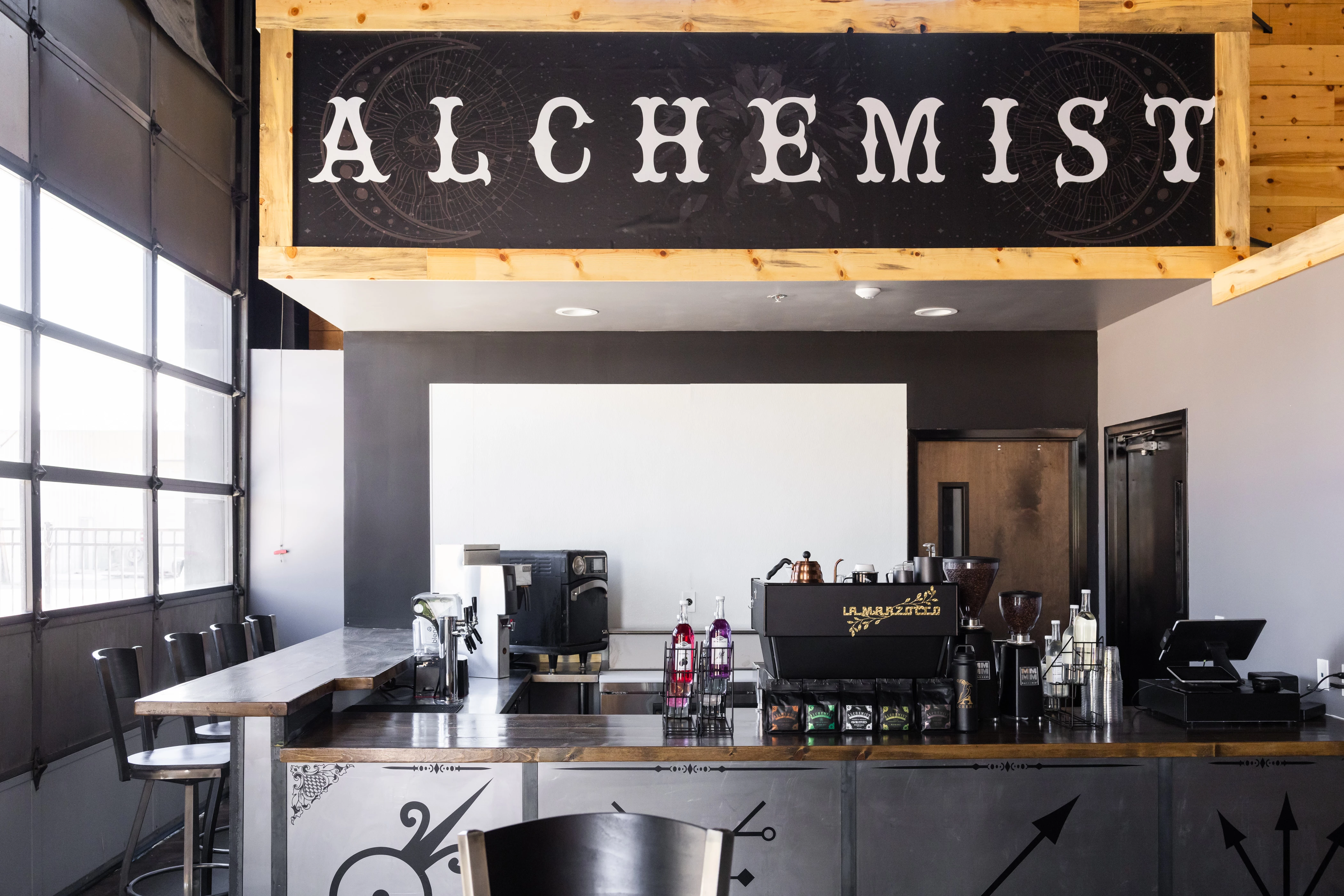 a sign above a bar