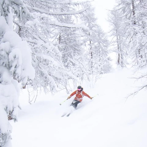 a person skiing down a slope