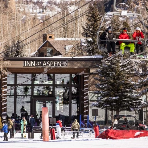 people on a ski lift