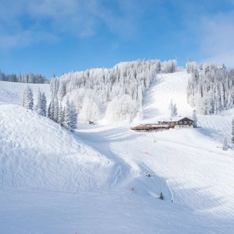 a building on a snowy mountain