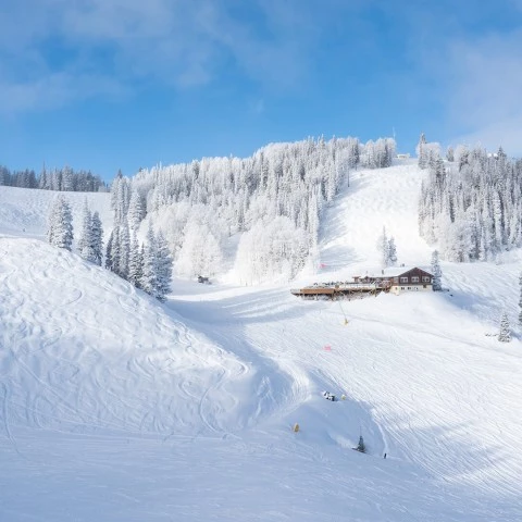 a building on a snowy mountain