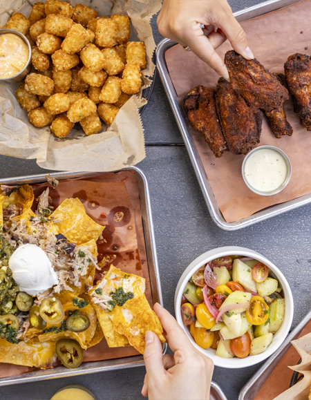 a group of trays with food on it