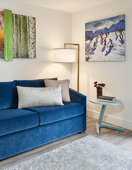 a blue couch in a room