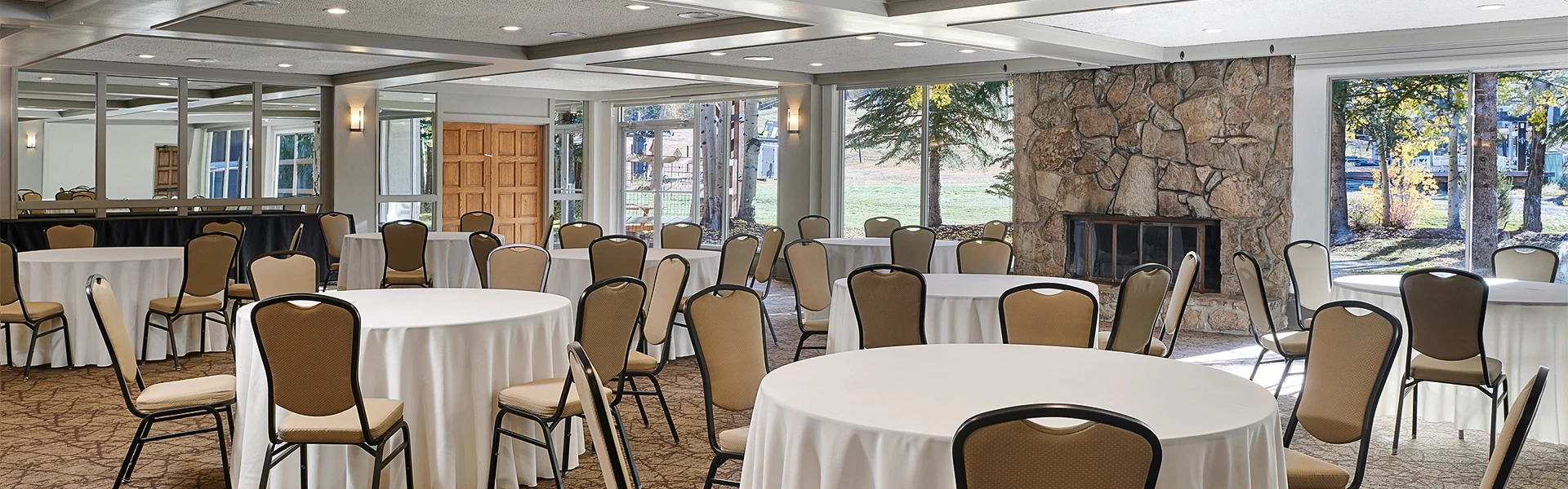 a room with tables and chairs