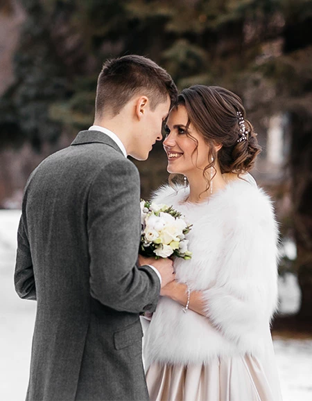 a man and woman in a white dress