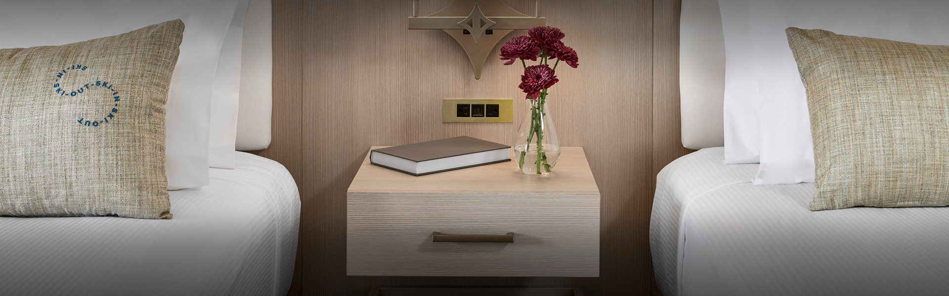 a book and flowers on a table
