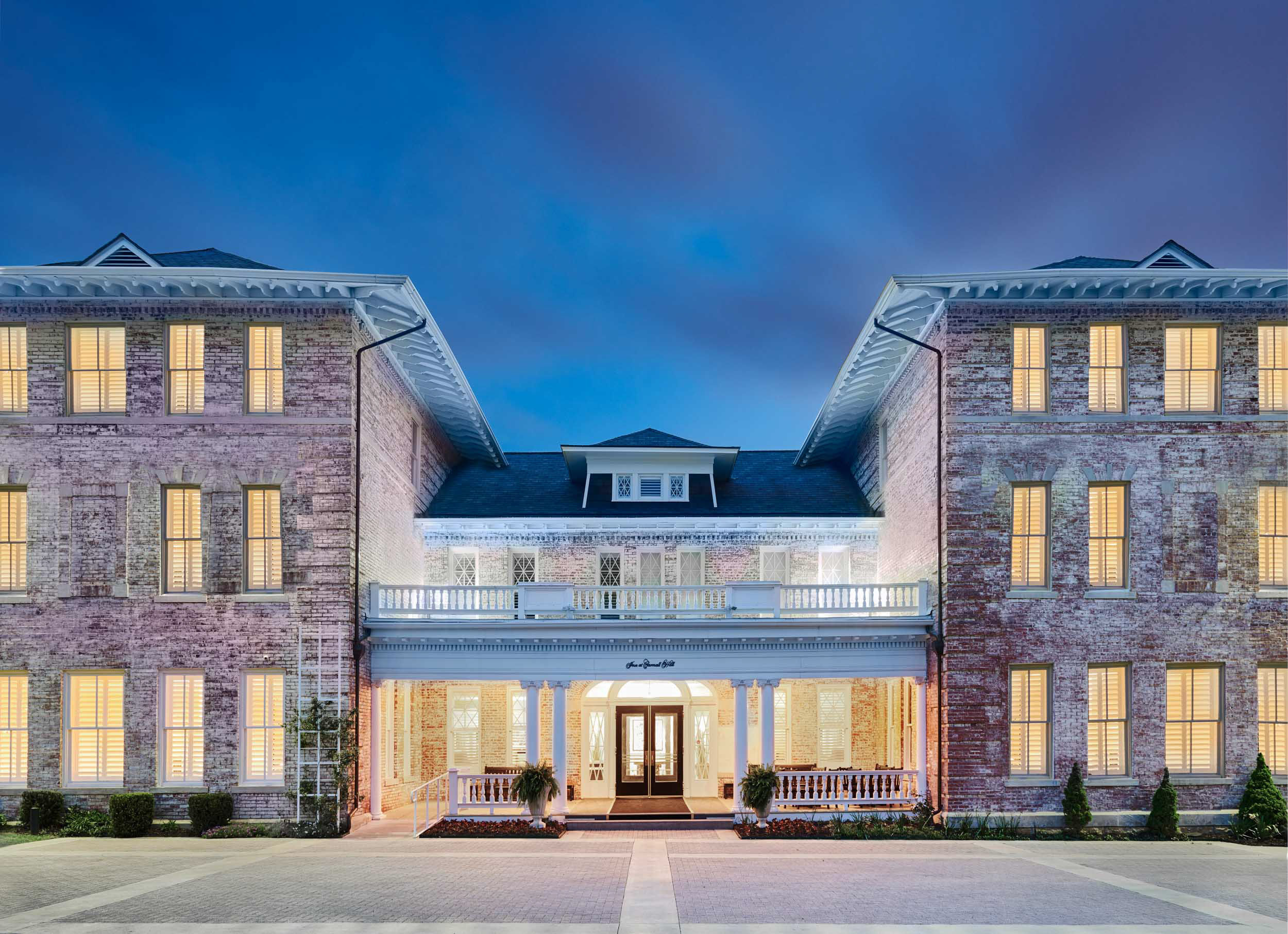 a large brick building with a large front entrance