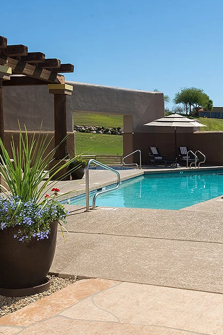 view of hotel pool with a view of the golf course