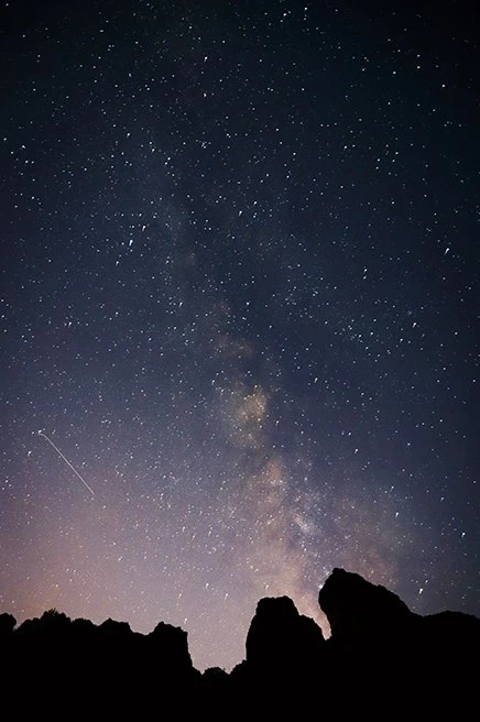 pink and dark purple starry night sky