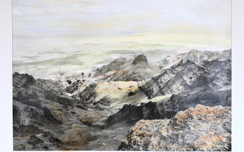 a landscape of mountains and clouds