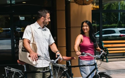 a man and woman on bicycles