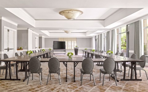 a room with tables and chairs