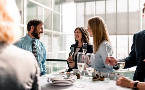 a group of people having a conversation