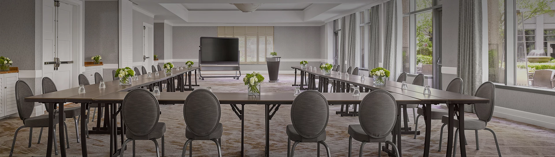 a room with tables and chairs