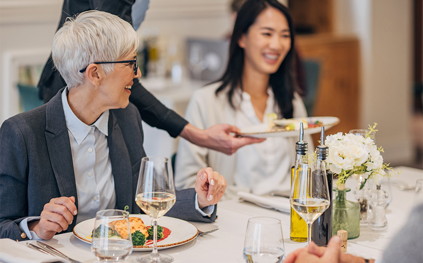 a group of people at a restaurant