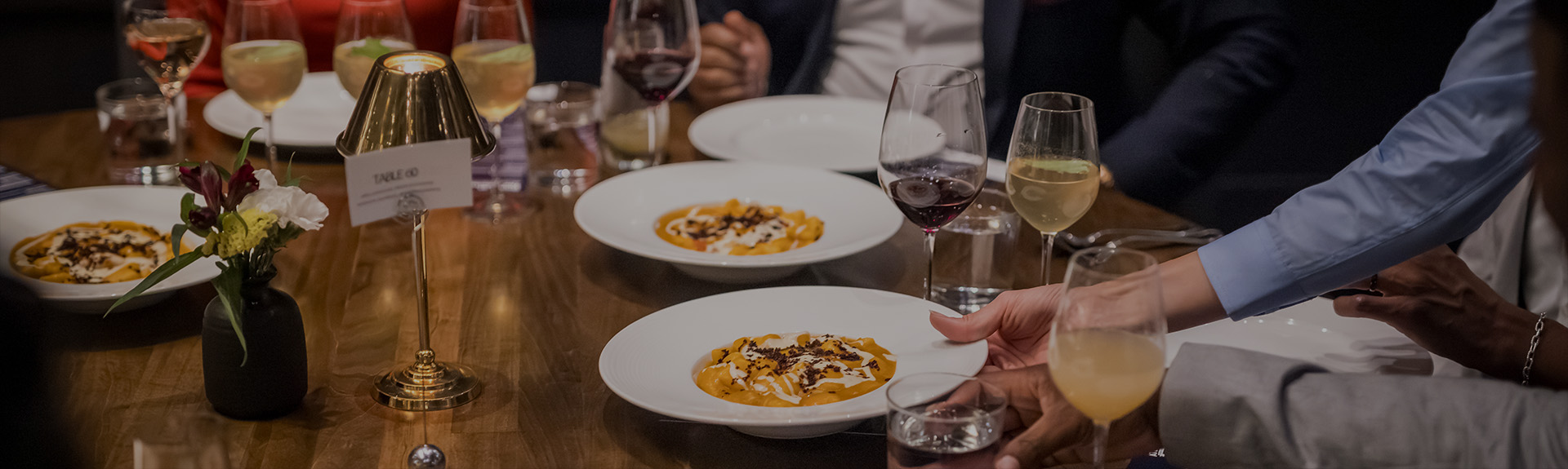 a person holding a plate of food