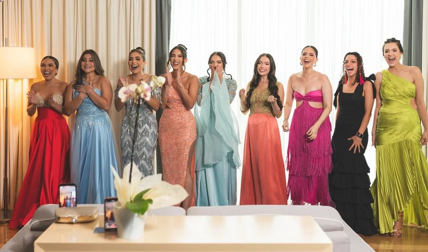 a group of women in dresses