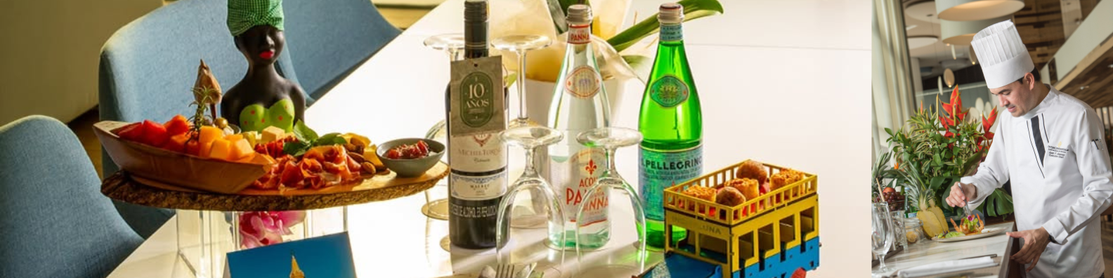 a table with wine glasses and bottles