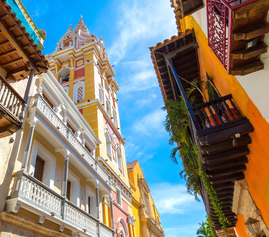 a colorful buildings with a bell tower