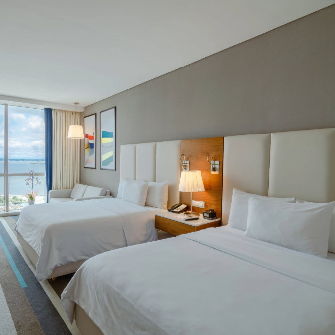 a hotel room with two beds