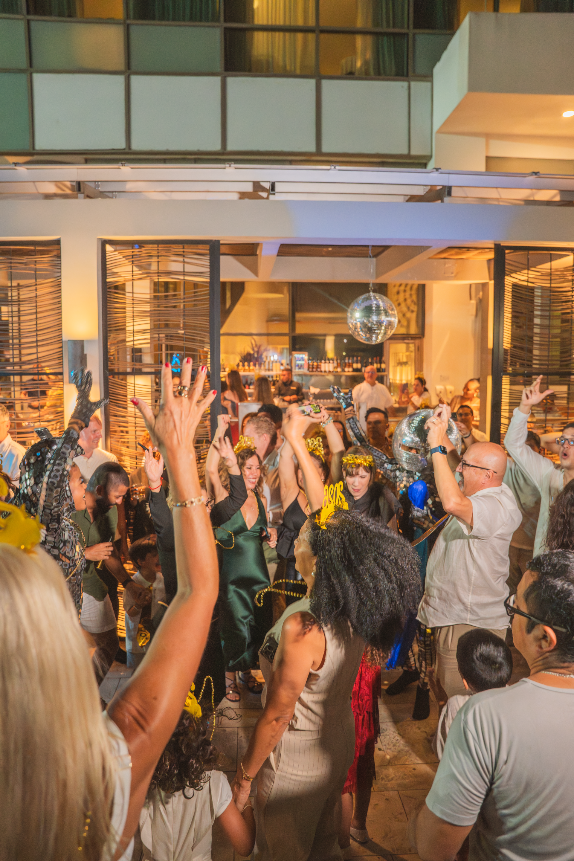 a group of people dancing in a room
