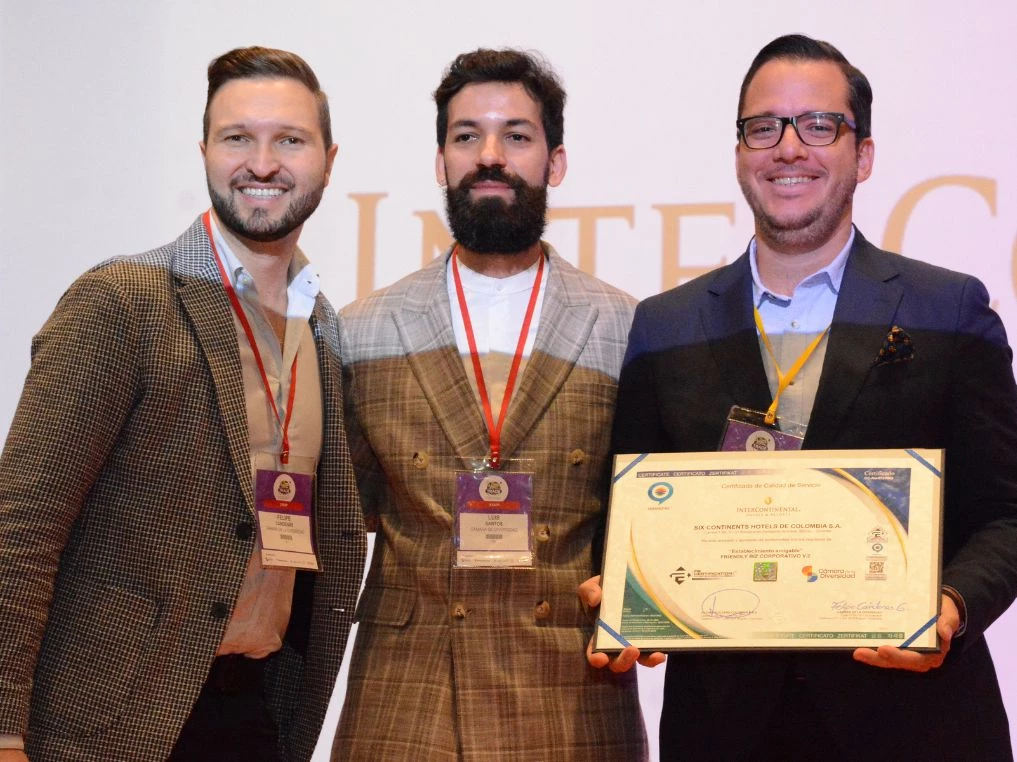 a group of men holding a certificate
