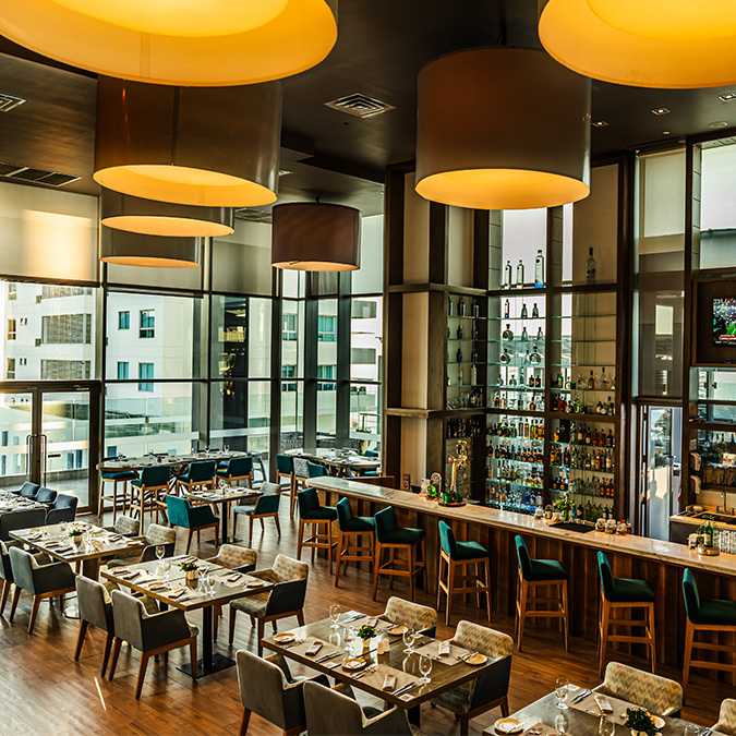 a restaurant with tables and chairs