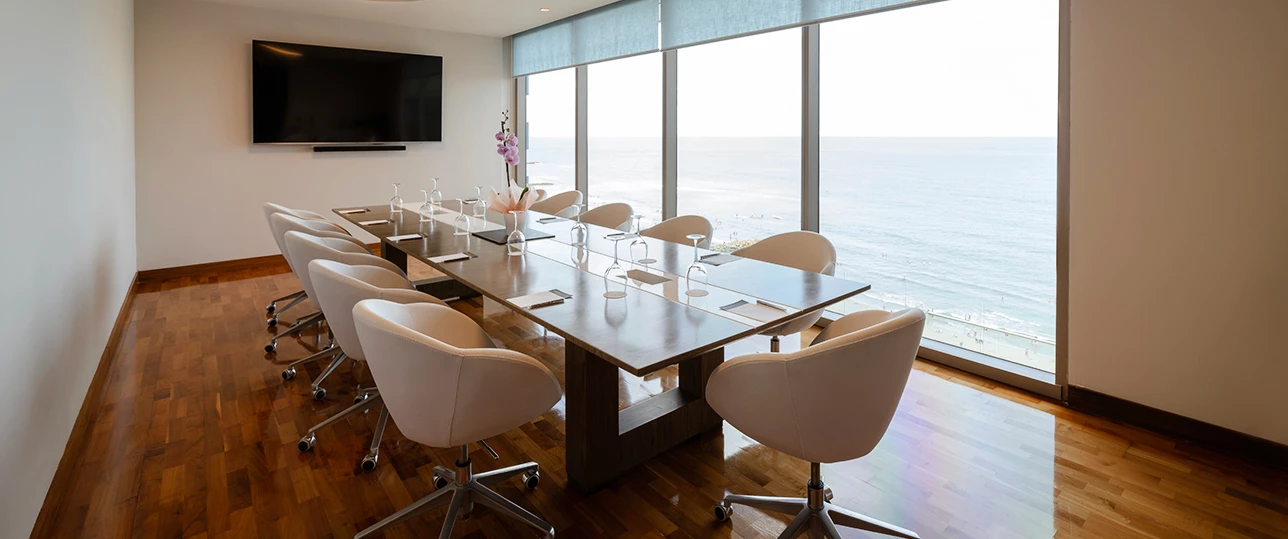 a dining table with chairs around it