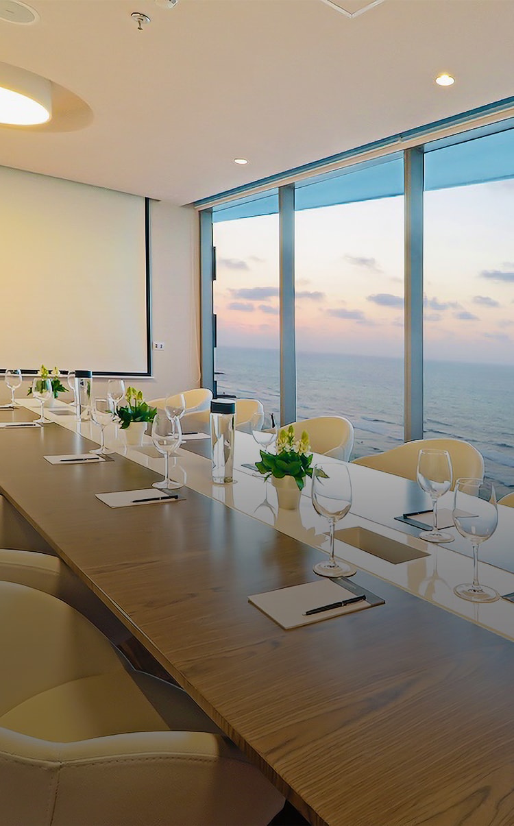 a dining table with a view of the city