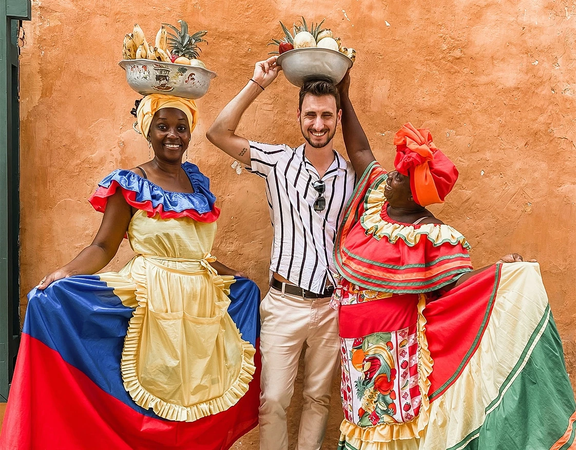 a man and woman wearing traditional clothing