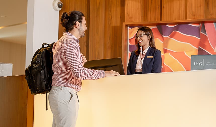 a man and a woman standing in front of a podium
