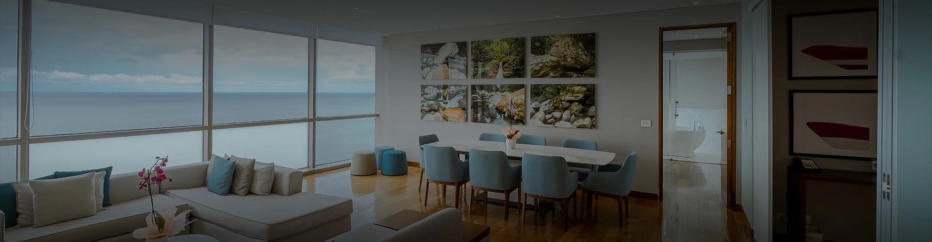 a room with a table chairs and a couch