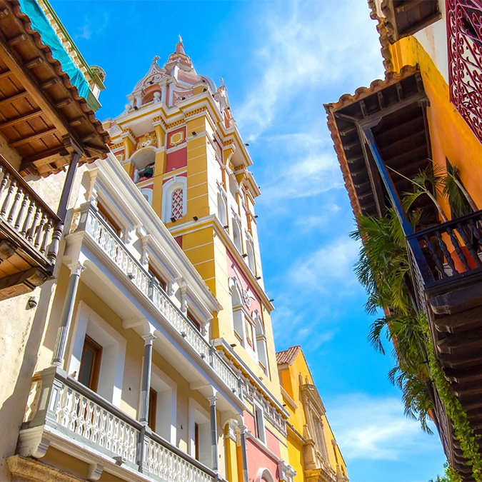 a colorful buildings with a bell tower