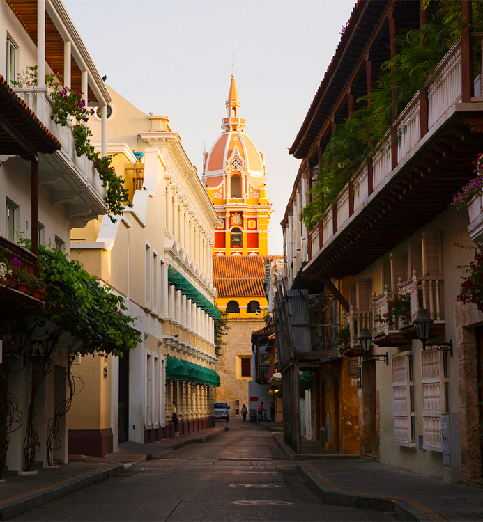 a street with buildings and a tower