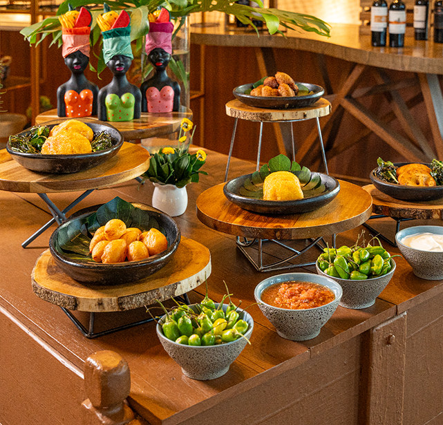 a table with different bowls of food