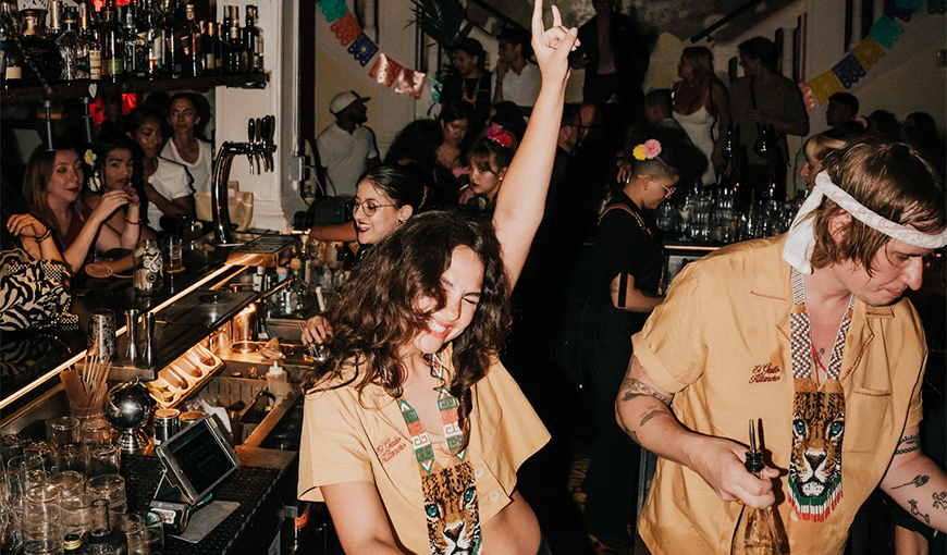a woman dancing in a bar