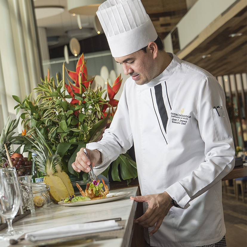 a man in a chef's hat