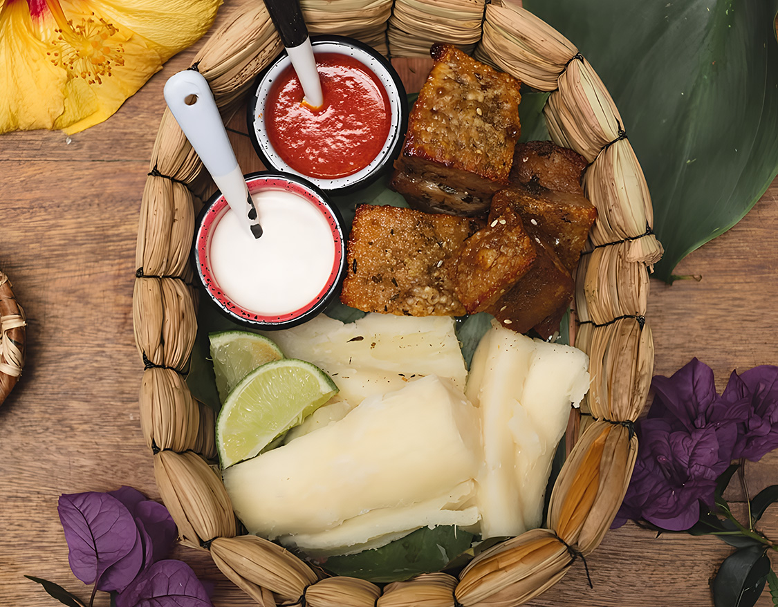 a basket of food with sauces and a fork