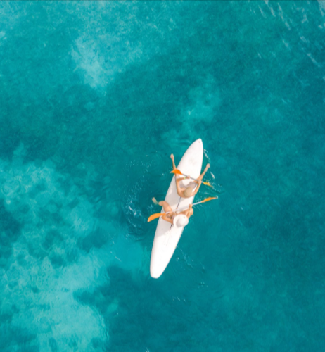 a person on a surfboard in the water