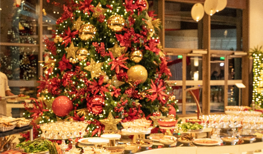 a christmas tree with food on a table