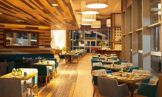 a restaurant with tables and chairs