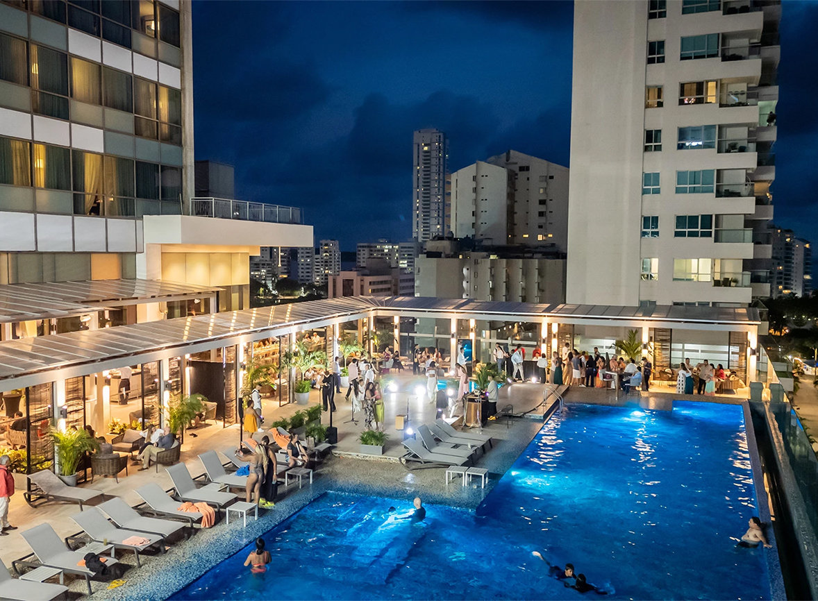 a pool with people around it