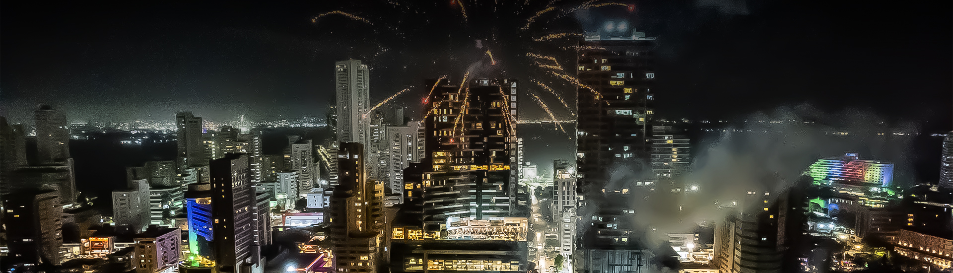 fireworks in the sky above a city