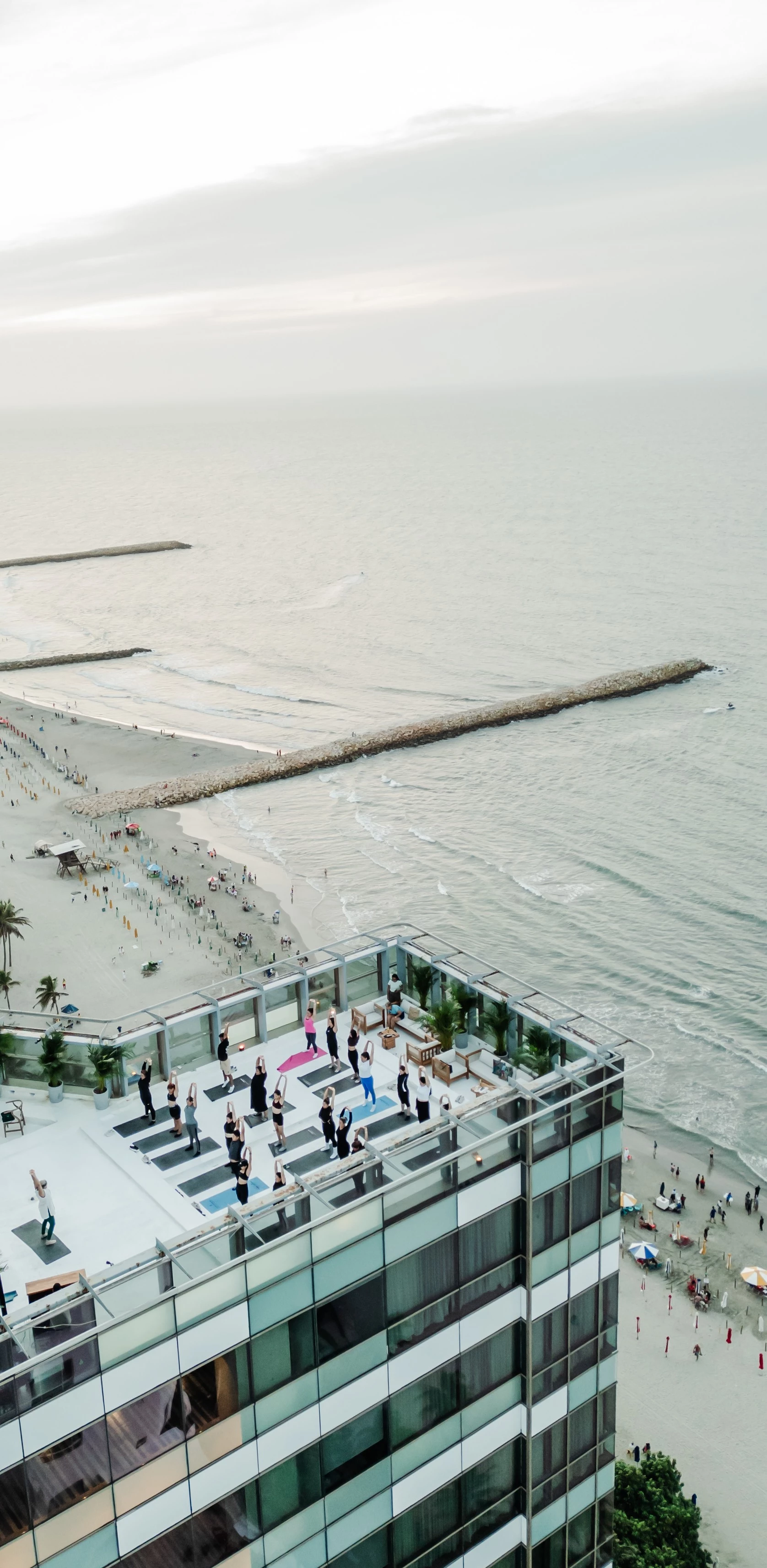 a group of people on a beach