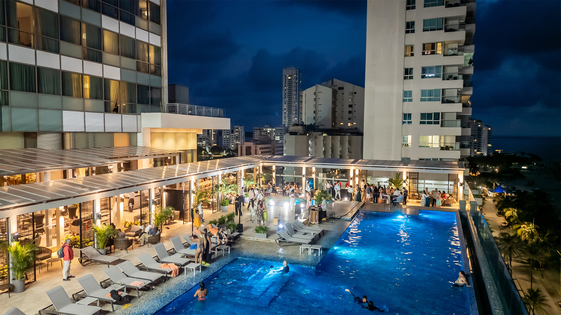 a pool with people around it