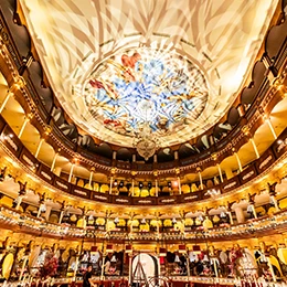 a large circular building with many lights and a chandelier