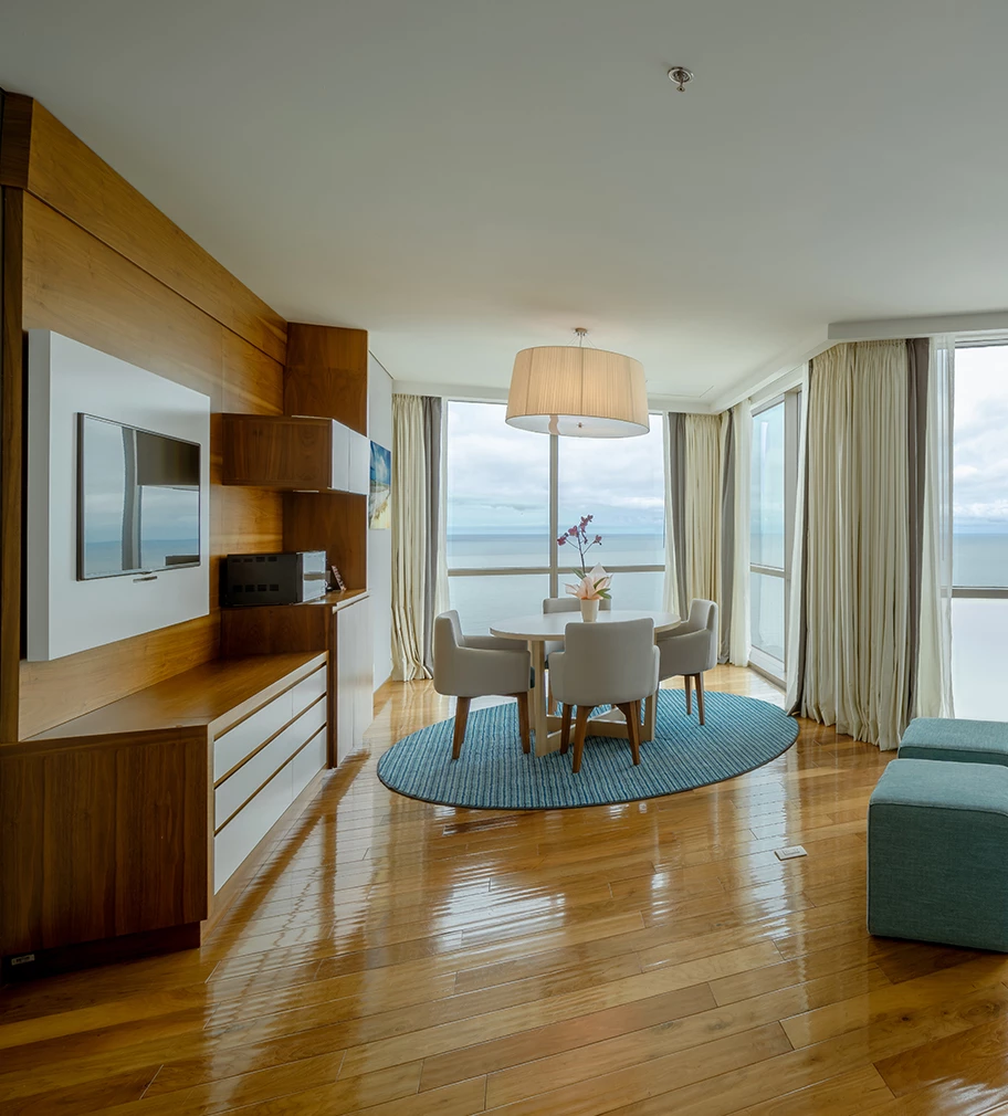 a room with a table and chairs