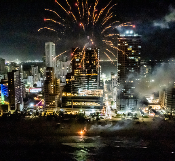 fireworks in the sky above a city