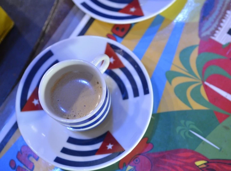 a two cups of coffee on saucers